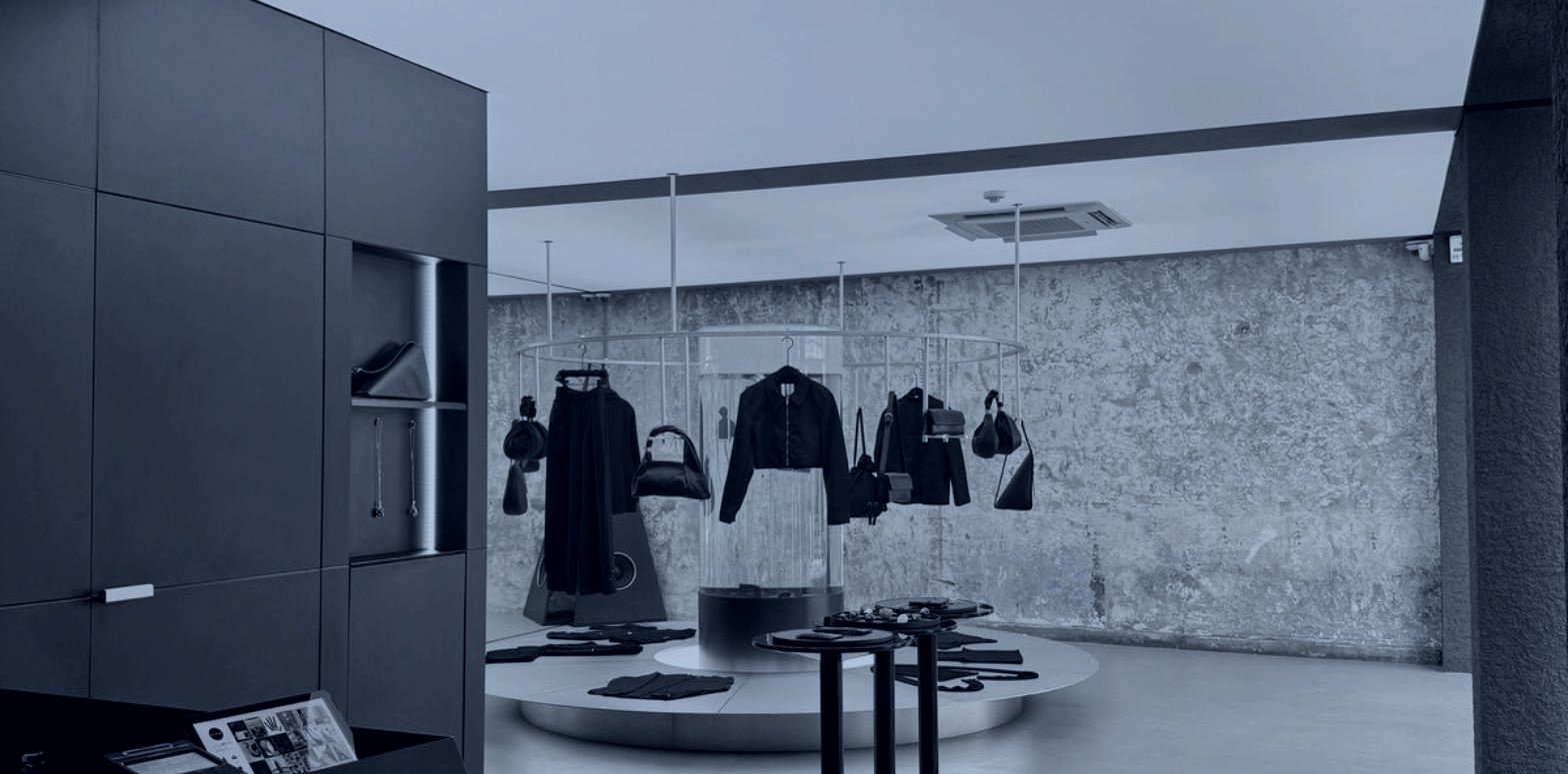 Dark concrete retail interior, fashion brand positioning for the Chinese market