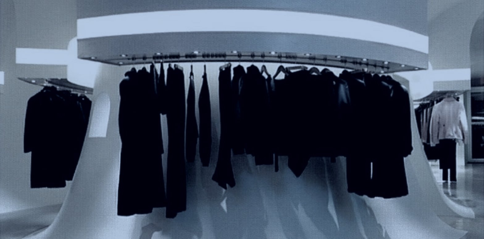 Lit curved rail of tailoring, Shanghai showroom and buyer introductions for fashion brands