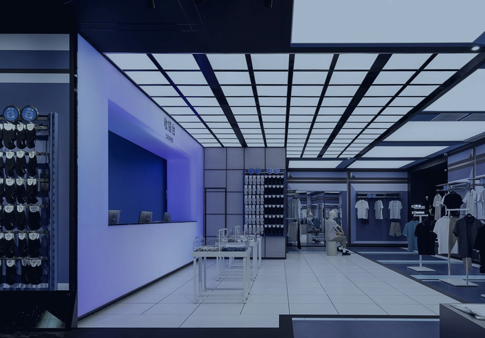 A retail floor lit in blue with stocked wall bays, fashion order fulfilment on time and in full
